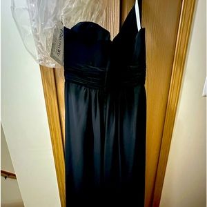 Christina wu black one shoulder dress. Size 4 Never worn. Still with tags